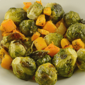 Roasted Brussels Sprouts and Sweet Potatoes on Plate